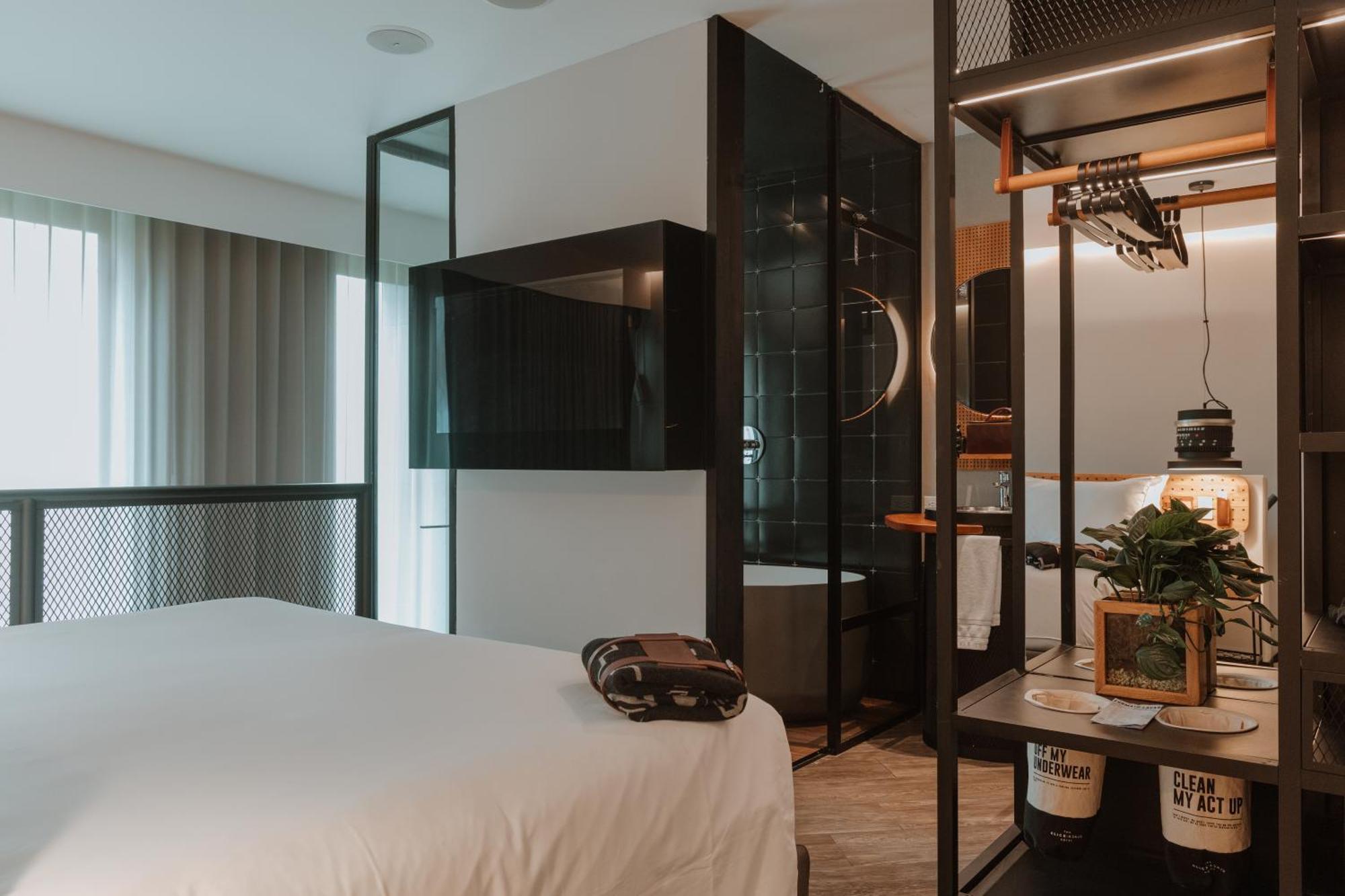 The Click Clack Hotel Medellín Esterno foto A room at the hotel