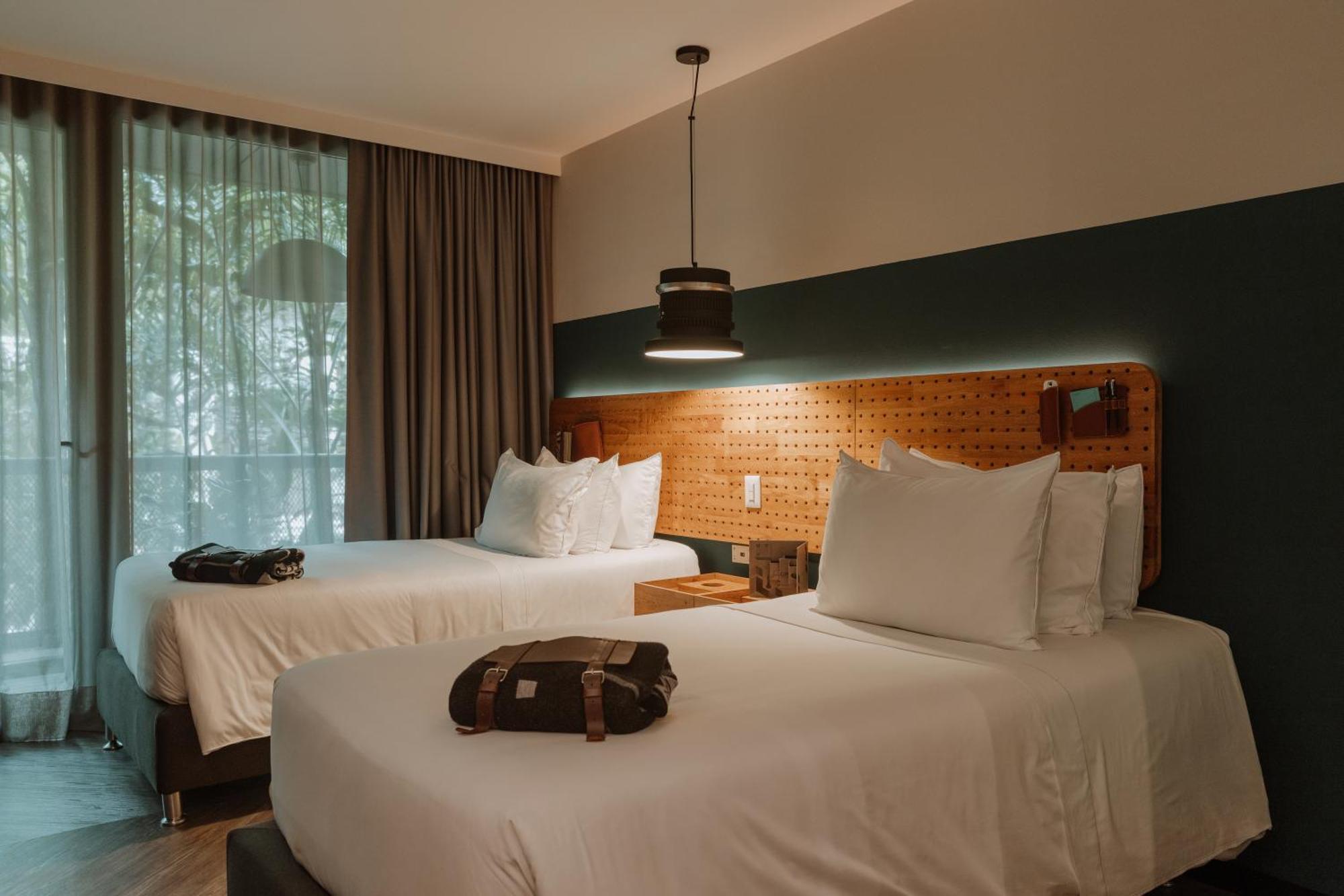 The Click Clack Hotel Medellín Esterno foto A room at the hotel