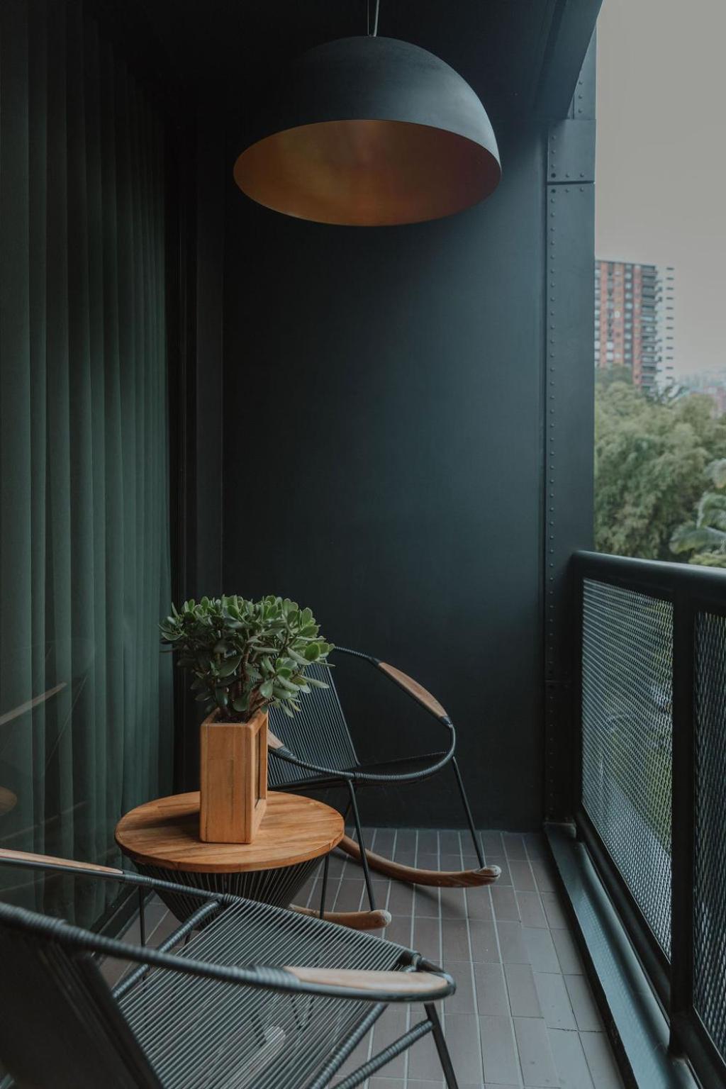 The Click Clack Hotel Medellín Esterno foto A balcony in a residential building in China