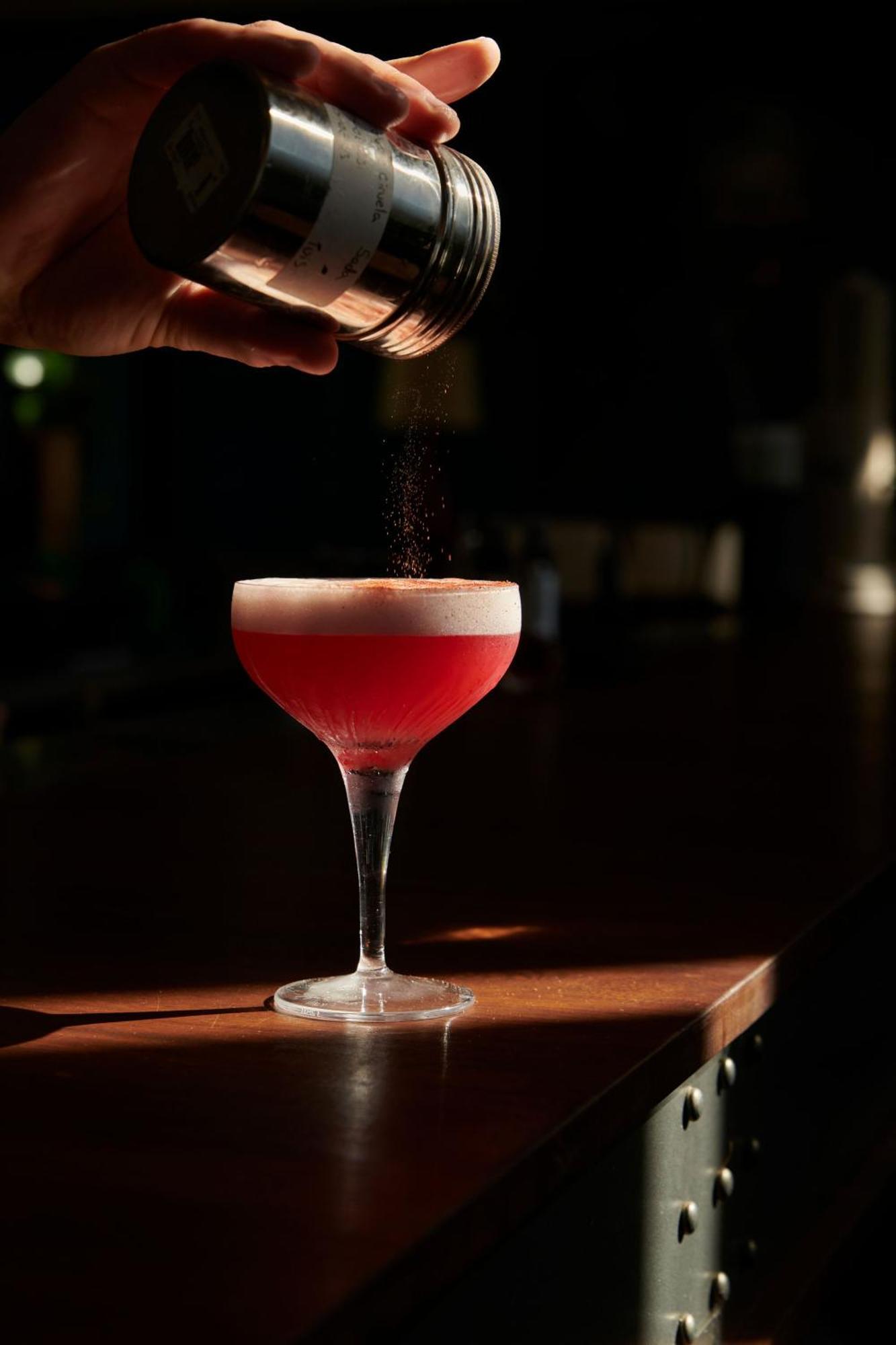 The Click Clack Hotel Medellín Esterno foto A Clover Club cocktail being garnished with ground nutmeg